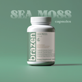 Brazen Sea Moss capsules bottle on a green background